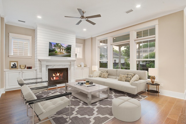 1363 Rivella Dr, Mount Pleasant, SC 29464 - living area with wood finished floors, ceiling fan, baseboards, a premium fireplace, and recessed lighting