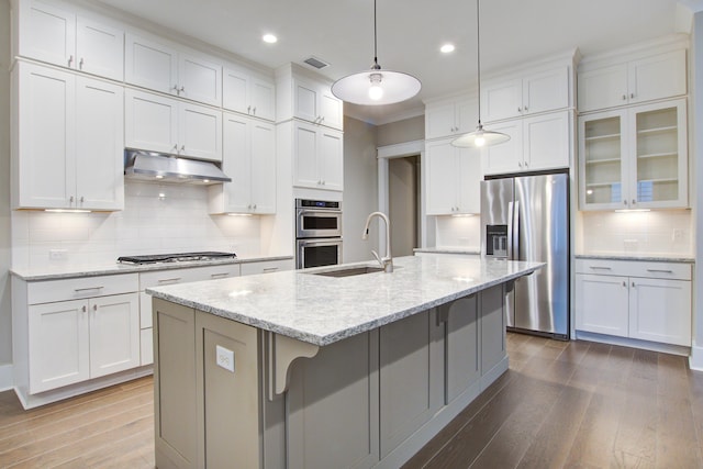 1363 Rivella Dr, Mount Pleasant, SC 29464 - kitchen featuring stainless steel appliances, under cabinet range hood, backsplash, white cabinetry, and recessed lighting