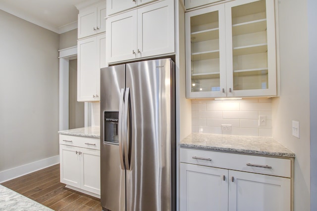 1363 Rivella Dr, Mount Pleasant, SC 29464 - kitchen featuring stainless steel fridge, backsplash, baseboards, dark wood-type flooring, and glass insert cabinets
