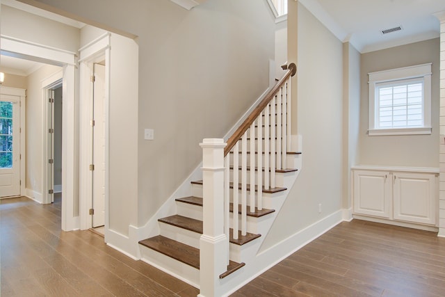 1363 Rivella Dr, Mount Pleasant, SC 29464 - stairs with crown molding, wood finished floors, healthy amount of natural light, and baseboards