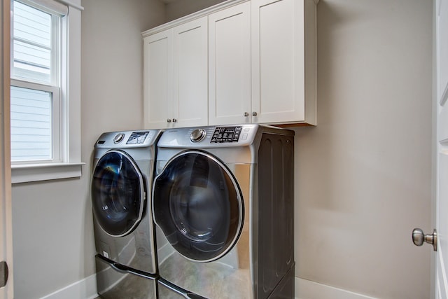 1363 Rivella Dr, Mount Pleasant, SC 29464 - washroom featuring cabinet space, washing machine and dryer, and baseboards