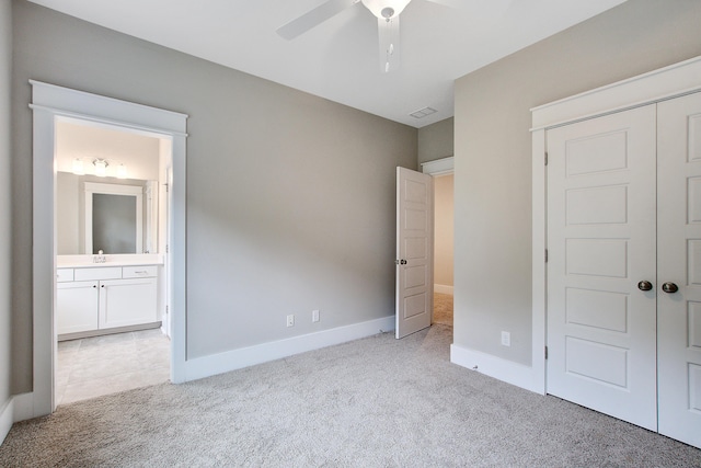 1363 Rivella Dr, Mount Pleasant, SC 29464 - unfurnished bedroom with light carpet, baseboards, connected bathroom, and a closet