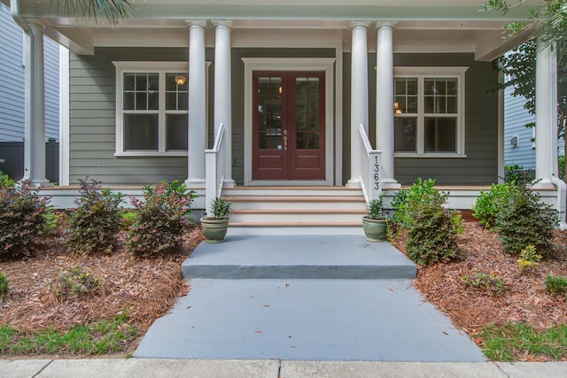 1363 Rivella Dr, Mount Pleasant, SC 29464 - view of exterior entry featuring a porch and french doors