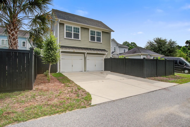 1363 Rivella Dr, Mount Pleasant, SC 29464 - view of side of home featuring concrete driveway and a garage