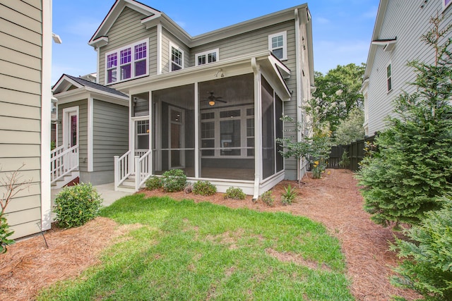 1363 Rivella Dr, Mount Pleasant, SC 29464 - back of house featuring a sunroom, entry steps, and ceiling fan