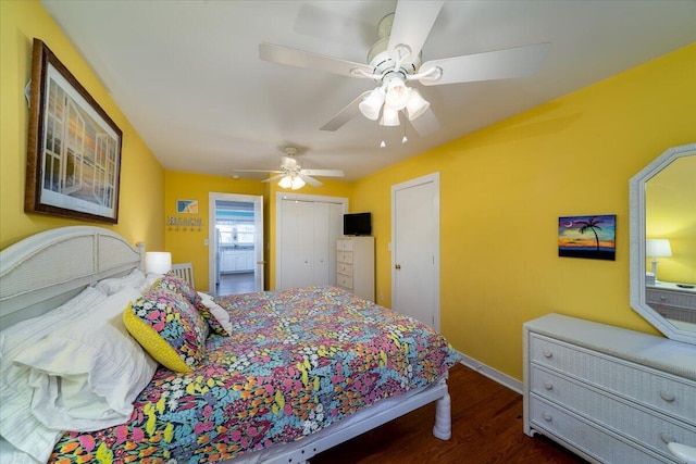 bedroom featuring ceiling fan and dark hardwood / wood-style flooring