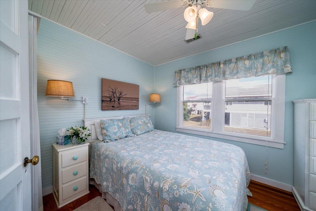 bedroom with hardwood / wood-style flooring and ceiling fan