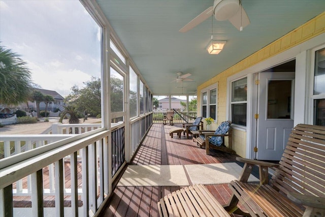 exterior space with ceiling fan