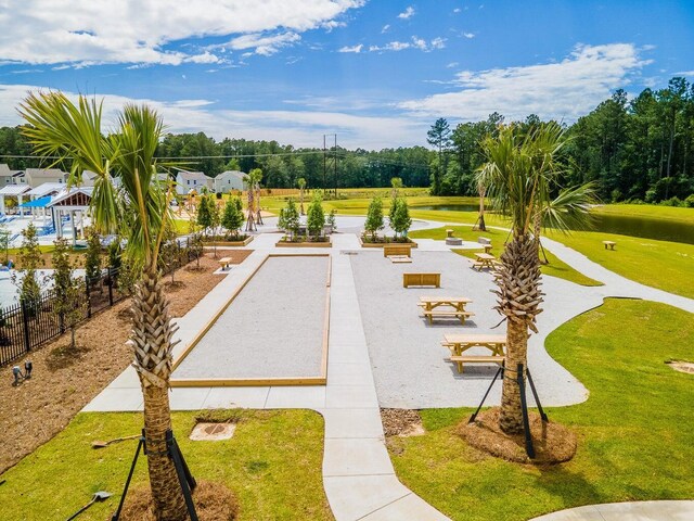 view of home's community with a lawn