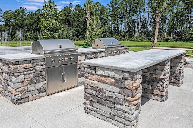 view of patio / terrace featuring an outdoor kitchen and grilling area