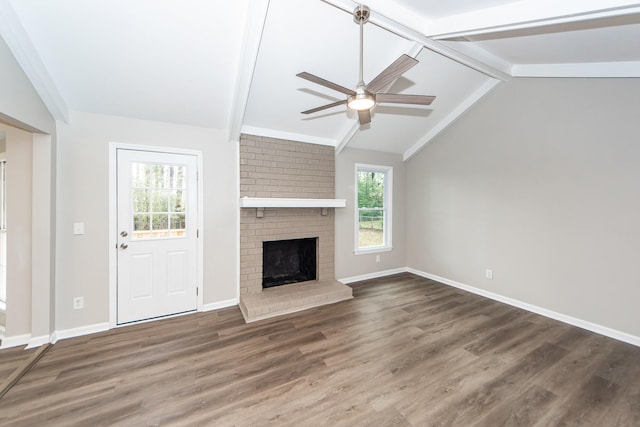 unfurnished living room featuring a fireplace, ceiling fan, dark hardwood / wood-style flooring, and lofted ceiling with beams