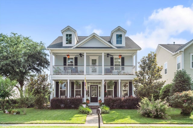 216 Foxbank Plantation Blvd, Moncks Corner, SC 29461 - view of front facade with a ceiling fan, a front lawn, a balcony, and a porch