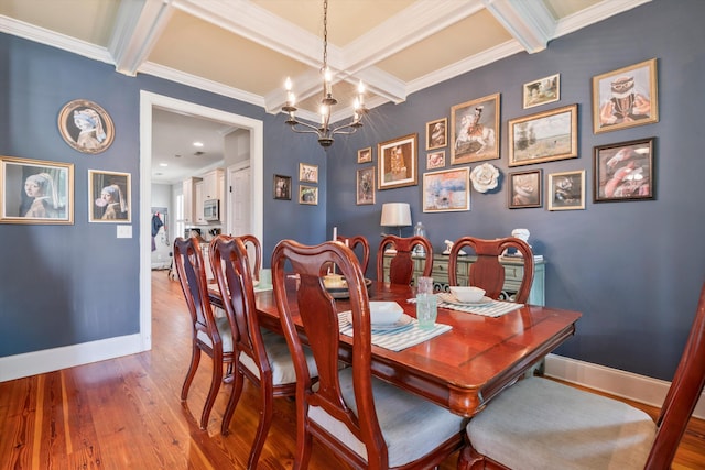 216 Foxbank Plantation Blvd, Moncks Corner, SC 29461 - dining space with coffered ceiling, baseboards, wood finished floors, a chandelier, and crown molding