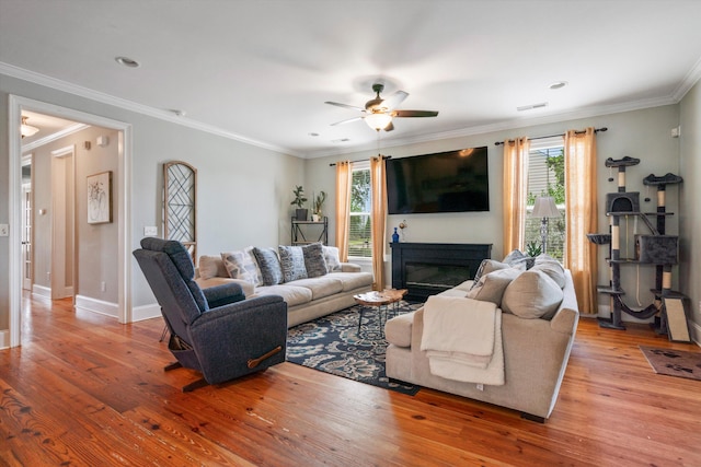 216 Foxbank Plantation Blvd, Moncks Corner, SC 29461 - living room with a ceiling fan, plenty of natural light, wood finished floors, and ornamental molding
