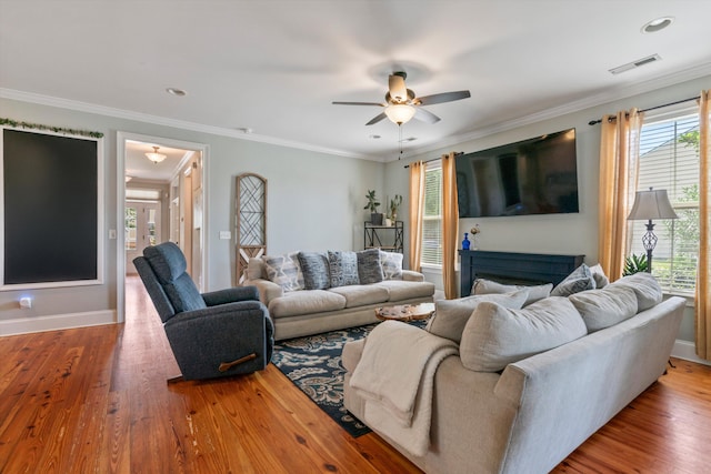 216 Foxbank Plantation Blvd, Moncks Corner, SC 29461 - living area with plenty of natural light, ceiling fan, wood finished floors, crown molding, and recessed lighting
