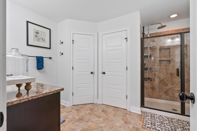 216 Foxbank Plantation Blvd, Moncks Corner, SC 29461 - bathroom with a shower stall, baseboards, and vanity