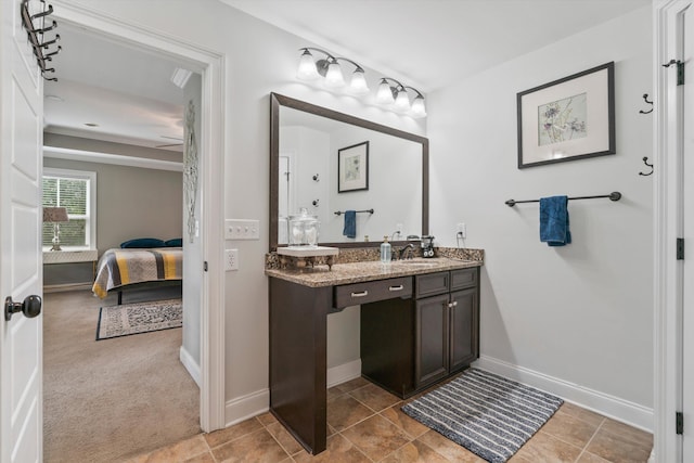 216 Foxbank Plantation Blvd, Moncks Corner, SC 29461 - ensuite bathroom featuring vanity, baseboards, and ceiling fan