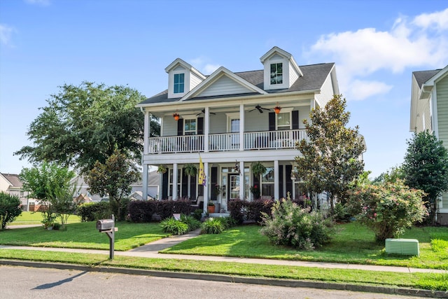 216 Foxbank Plantation Blvd, Moncks Corner, SC 29461 - view of front of home with a ceiling fan, a front lawn, a balcony, and a porch