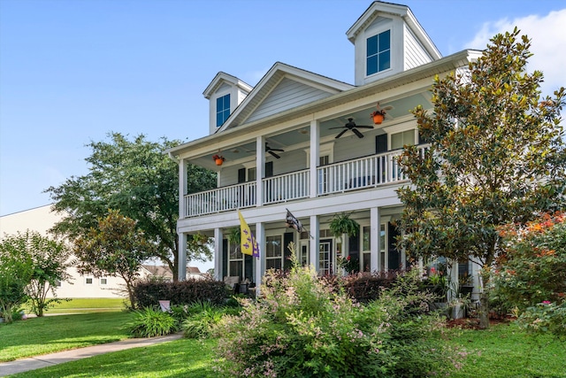 216 Foxbank Plantation Blvd, Moncks Corner, SC 29461 - view of front of property with ceiling fan, a front yard, and a balcony