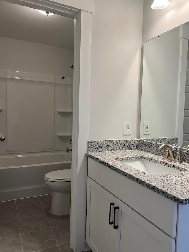 full bathroom featuring tile patterned floors, vanity, shower / bathtub combination, and toilet