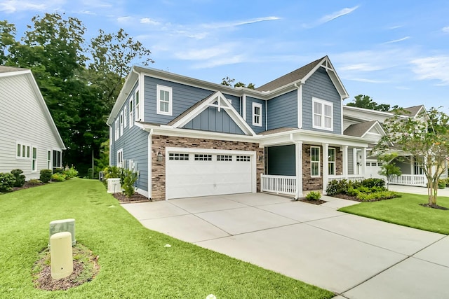 craftsman-style house with a garage, a porch, and a front yard