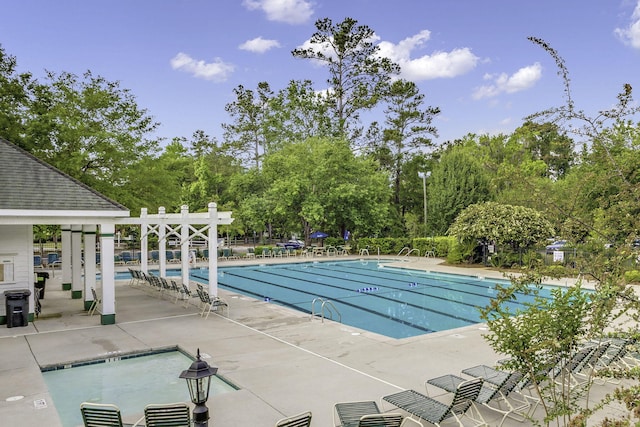 pool with a patio area