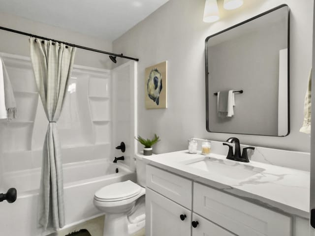 full bathroom with shower / bathtub combination with curtain, vanity, and toilet