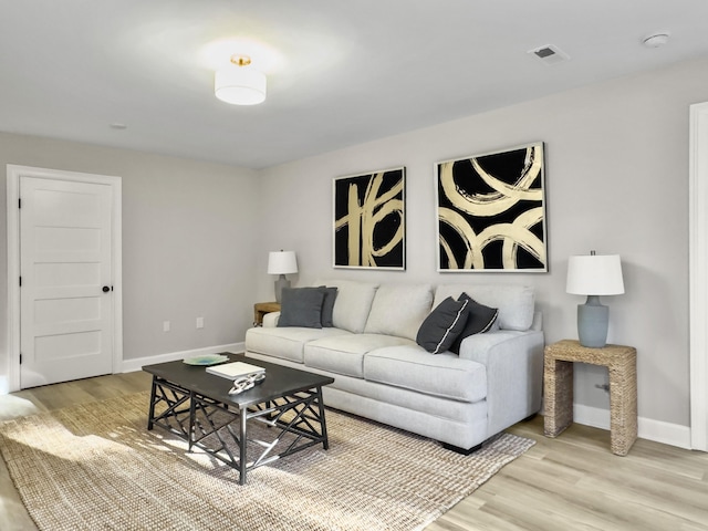 living room with light wood-type flooring