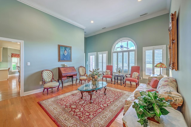 109 Waveney Cir, Goose Creek, SC 29445 - living room with healthy amount of natural light, a towering ceiling, wood finished floors, ornamental molding, and recessed lighting