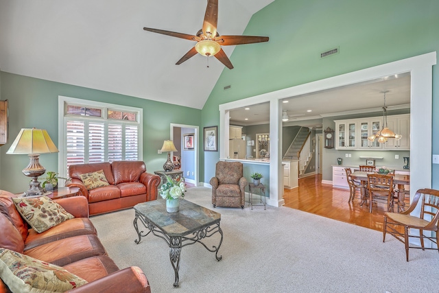 109 Waveney Cir, Goose Creek, SC 29445 - living room featuring a ceiling fan, light colored carpet, stairs, high vaulted ceiling, and recessed lighting