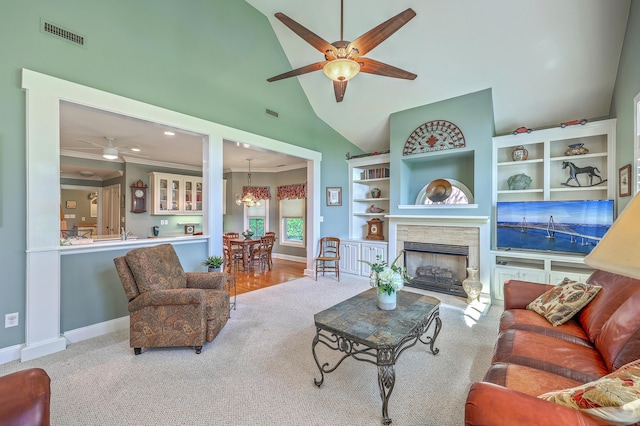 109 Waveney Cir, Goose Creek, SC 29445 - living area with ceiling fan, a stone fireplace, carpet floors, a chandelier, and high vaulted ceiling