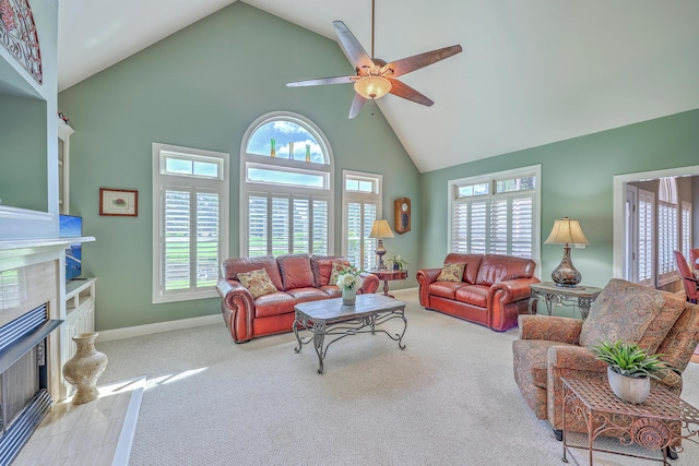 109 Waveney Cir, Goose Creek, SC 29445 - carpeted living room featuring high vaulted ceiling, a high end fireplace, healthy amount of natural light, and ceiling fan