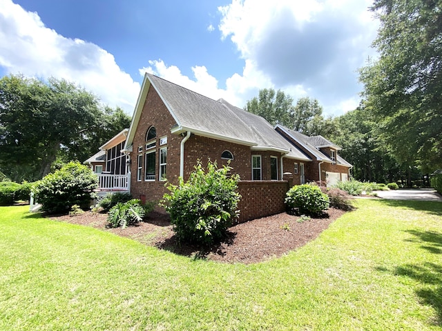 109 Waveney Cir, Goose Creek, SC 29445 - view of home's exterior with brick siding, a yard, a garage, and roof with shingles