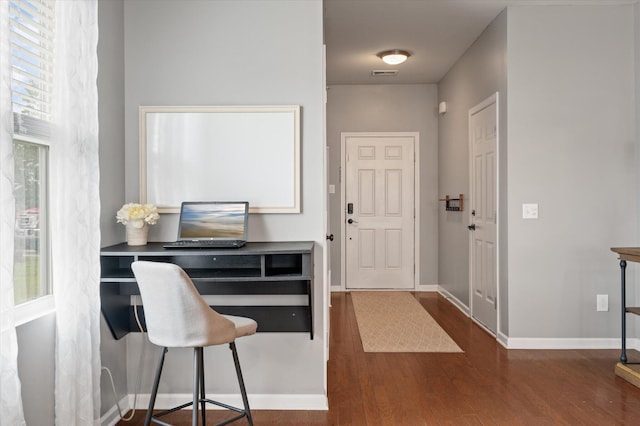 foyer with dark wood-type flooring