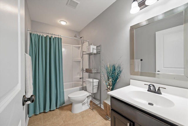 full bathroom featuring shower / bath combination with curtain, tile patterned floors, vanity, and toilet