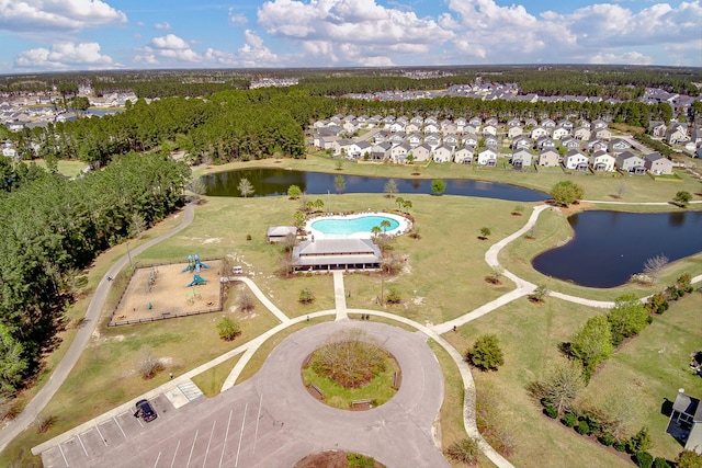 drone / aerial view with a water view