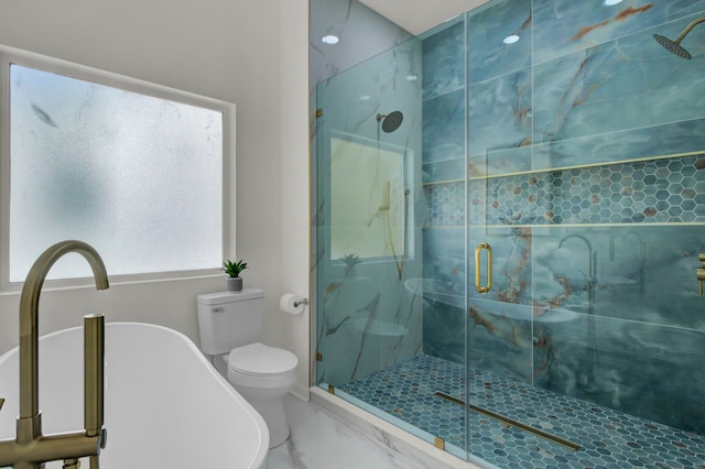 bathroom featuring toilet and separate shower and tub