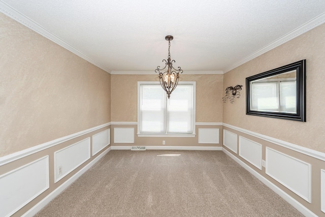 102 Six Point Ct, Goose Creek, SC 29445 - carpeted empty room with a chandelier, ornamental molding, a decorative wall, and a wainscoted wall