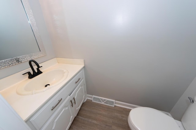 102 Six Point Ct, Goose Creek, SC 29445 - half bathroom featuring vanity, toilet, wood finished floors, and baseboards