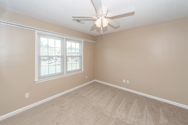 102 Six Point Ct, Goose Creek, SC 29445 - unfurnished room with light carpet, ceiling fan, baseboards, and a textured ceiling
