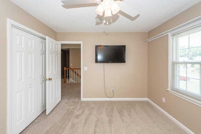 102 Six Point Ct, Goose Creek, SC 29445 - unfurnished bedroom with light colored carpet, a closet, baseboards, and a ceiling fan