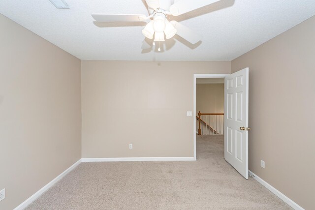 102 Six Point Ct, Goose Creek, SC 29445 - empty room featuring light colored carpet, a ceiling fan, and baseboards