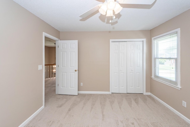 102 Six Point Ct, Goose Creek, SC 29445 - unfurnished bedroom featuring carpet floors, a closet, baseboards, and a ceiling fan