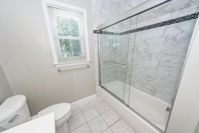 102 Six Point Ct, Goose Creek, SC 29445 - bathroom with baseboards, toilet, marble finish flooring, and combined bath / shower with glass door