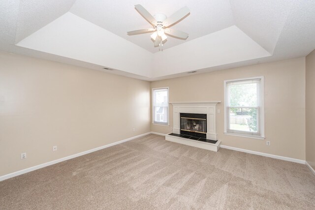 102 Six Point Ct, Goose Creek, SC 29445 - unfurnished living room with a raised ceiling, light carpet, and plenty of natural light