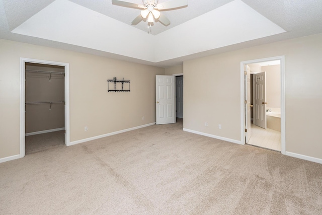 102 Six Point Ct, Goose Creek, SC 29445 - unfurnished bedroom featuring a raised ceiling, carpet flooring, and a walk in closet