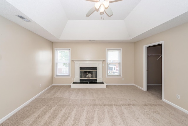 102 Six Point Ct, Goose Creek, SC 29445 - unfurnished living room featuring a raised ceiling, light colored carpet, and ceiling fan