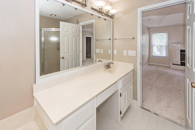 102 Six Point Ct, Goose Creek, SC 29445 - bathroom featuring vanity, tile patterned floors, baseboards, and an enclosed shower