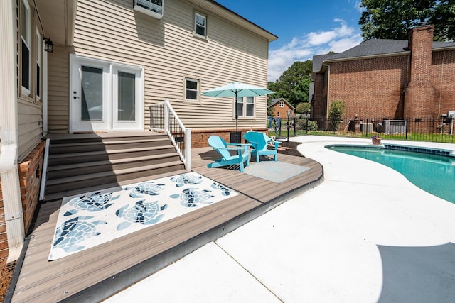 102 Six Point Ct, Goose Creek, SC 29445 - view of swimming pool featuring fence, a wooden deck, and a patio