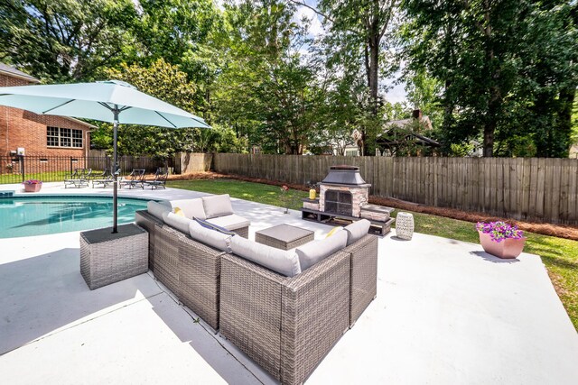 102 Six Point Ct, Goose Creek, SC 29445 - view of patio featuring a fenced backyard and an outdoor living space with a fireplace